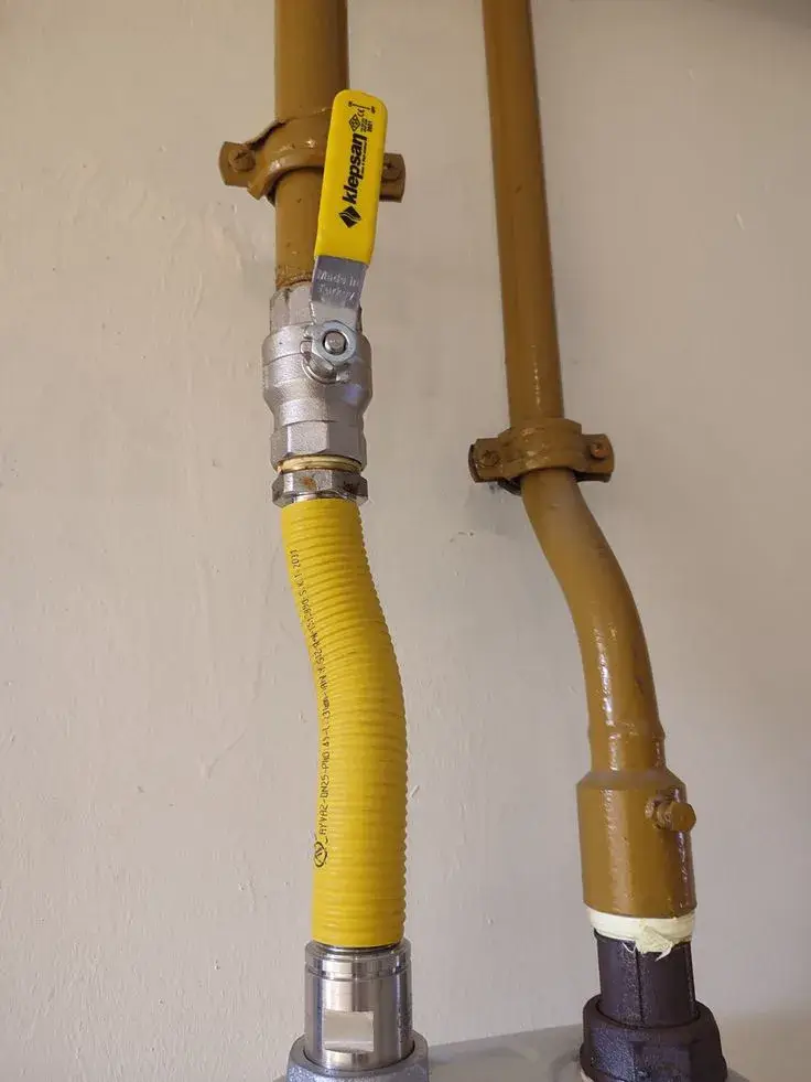 Yellow CSST gas line with a shut-off valve